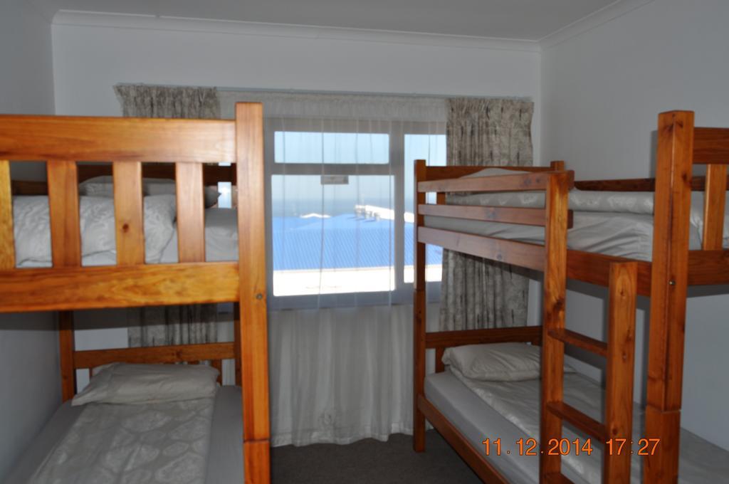 Backpacker Apartments Plettenberg Bay Quarto foto